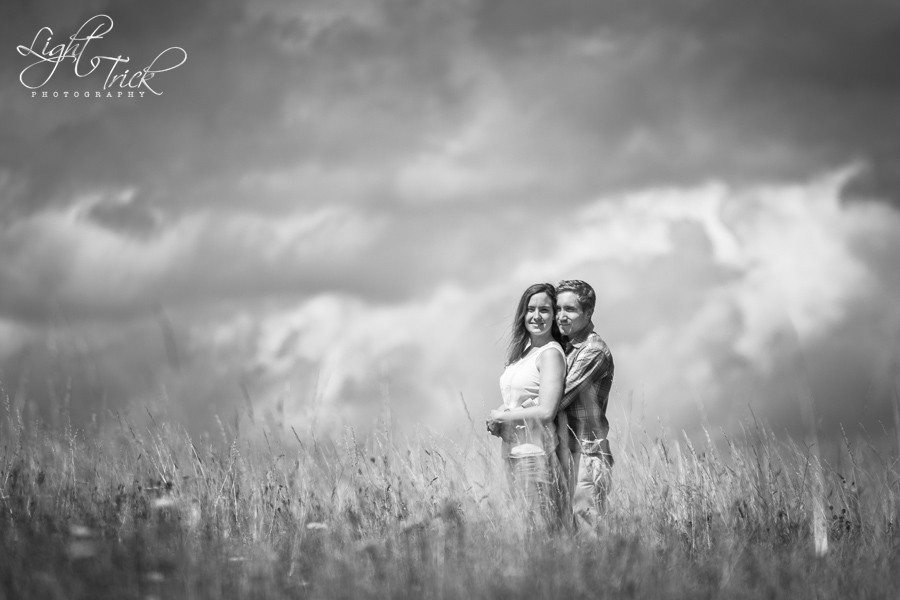 young couple in a grassy field